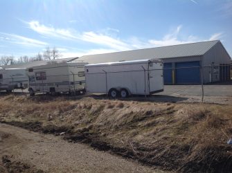 movable storage trailers in front of a storage garage