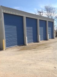 4 closed doors of a storage garage